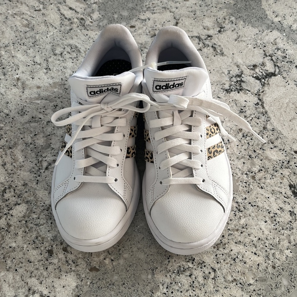Adidas kicks with leopard print design size 7 1-2 in excellent condition.